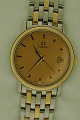 ebuy.dk pr�senterer: Omega herrearmb�ndsur, udf�rt i guld og st�l, quartzv�rk, fungerende, diameter: 35mm
Fremst�r ...