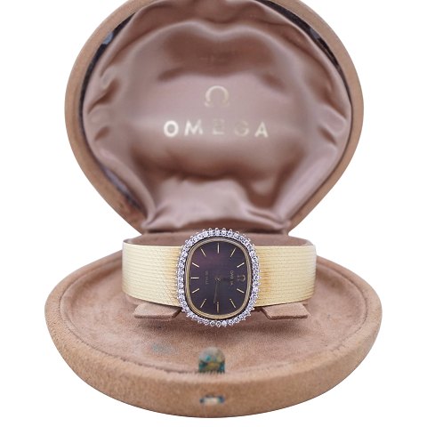 Omega, model De Ville; Dameur af 18 kt. guld med diamanter