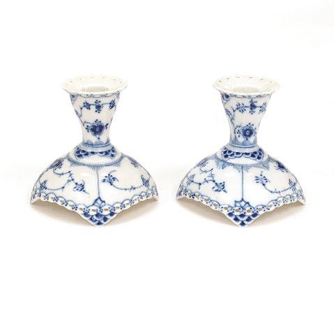 Royal Copenhagen: A pair of blue fluted full lace 
candlesticks 1138. H: 10cm