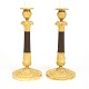 A pair of gilt Bronze candelsticks. France circa 1810-20. H: 33cm