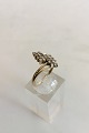 Gold ring in 14K with 16 small stones