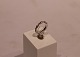 Twisted ring of 925 sterling silver with small clear stones, stamped CT.
5000m2 showroom.