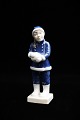 Royal Copenhagen porcelain figurine of a girl with a snowball. 
RC# 5656...