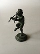 Bronze Figur af en Pan der spiller fløjter. Måler 8,5cm og fremstår med fin patina og i god stand.