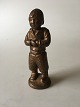 Grønlænder Dreng i Bronce fra Brdr. Grage Bronzestøberi. Signeret TR 1939. Måler 17cm høj og er ...