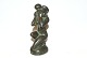 Figur af kvinde med barnDiskometal med gips centerStemplet RUNAHøjde 15 cm.Flot ...