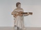 Stor Bing & Grøndahl Figur, dame med guitar.Af fabriksmærket ses det, at denne er fra mellem ...