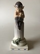 Royal Copenhagen Figur Faun på søjle med firben #433. Måler 21cm og er i perfekt stand. Designed ...