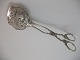 Kagetang i sølv fremstillet ca. 1900. Længde ca. 17,4 cm. Vare nr. 178768.