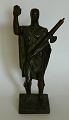 Tung bronzefigur i art deco stil fra det 20. århundrede. Ubekendt kunstner. Fremstår i god ...