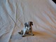 Dahl Jensen Figur 1008 siddende seyleyham Hvalp. H. 9 Cm. L. 12 Cm. 1. Sortering