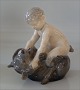 Kgl. figur fra Royal Copenhagen 0648 Pan på bjørn Chr Thomsen 16 cm  I hel og fin stand PUK, Faun