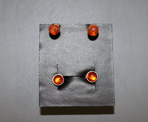 Silver stud earrings with amber.
5000 m2 showroom.