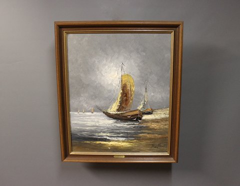 Oil painting of ships out at sea with a dark wooden frame signed Belfort.
5000m2 showroom.
