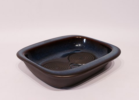 Brown ceramic dish with a dark blue glaze by Søholm, no.: 3456.
5000m2 showroom.