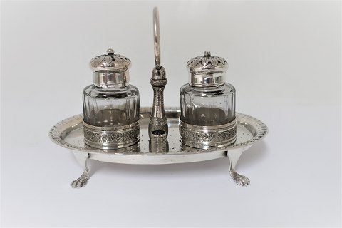 Johan Gerhard Struntze. Salt & pepper set in holder stamped IGS. Produced 
between 1820-1847. Length of the tray 13 cm.