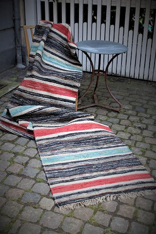 Old Swedish cloth rug in fine colors and good quality. Measures: 480x82cm.