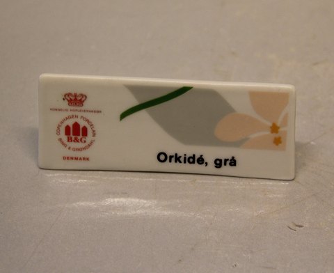 Orkidee, Grå Bing & Grøndahl Reklame Skilt for  Grå Orkide ca 4 x 10 cm
