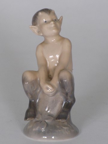 Faun on tree stump 
Royal Copenhagen
Porcelain