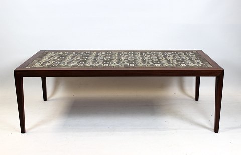 Coffee table of rosewood and brown tiles from Royal Copenhagen, by Severin 
Hansen for Haslev Furniture Factory from the 1960s.