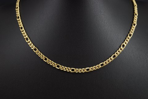A long figaro necklace of 18k gold