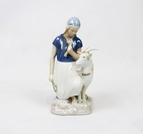 Porcelain figure of girl with goat, no.: 2180 design by Axel Loche for B&G.
Great condition

