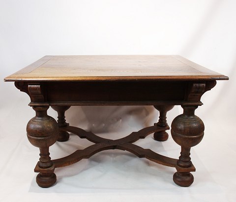 Large antique oak table from the 1860s  suitable as dinner table or desk.
5000m2 showroom.