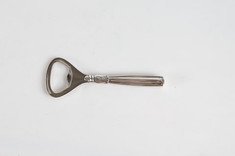 Lotus Silver Cutlery
Small bottle opener
L. 10,5 cm