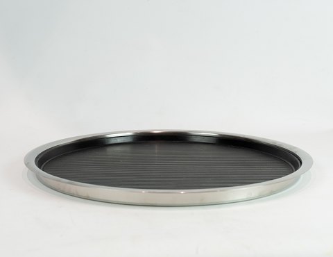 Dish of stainless steel with black wooden tray by Stelton.
5000m2 showroom.