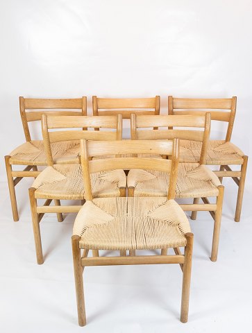 Set of six dining room chairs, model BM1, of oak and paper cord, designed by 
Børge Mogensen from the 1960s.
5000m2 showroom.
