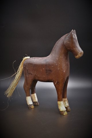 Swedish 1800 Century horse in wood with original paint in brown color. 
H:27cm. L:23cm.