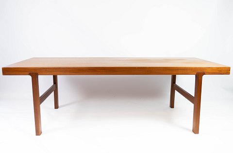 Coffee table in teak with extension plate of danish design from the 1960s. 
5000m2 showroom.