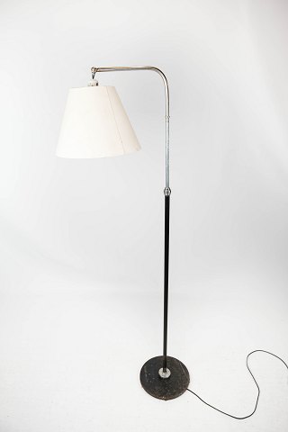 Floor lamp of chrome and black painted metal of Danish design from the 1970s. 
5000m2 showroom.
