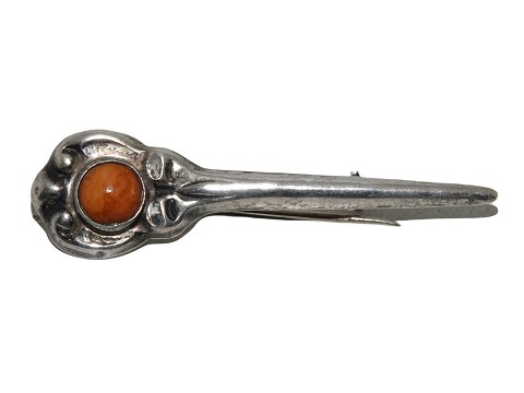 Cort Hannibal 
Danish Art Nouveau silver brooch with amber from 1914-1937