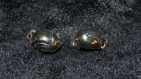 Øreringe med clips i sølv
Stemplet 925 s
Måler 14,51*10,22 mm