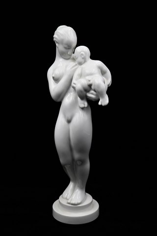 Kai Nielsen (1882-1924) "Woman with child" in Blanc de Chine 
(white porcelain) from Bing & Grondahl. 
B&G#111. 1.sort. Height:31,5 cm.