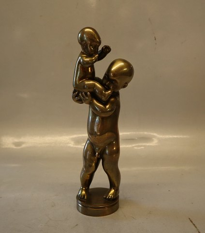 Kai Nielsen no 10 Gilt Bronze  Boy lifting baby 23 cm
