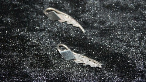 Elegant # Earrings in Silver
Stamped 925 BS
Measures 24.86 mm
Nice and well maintained condition