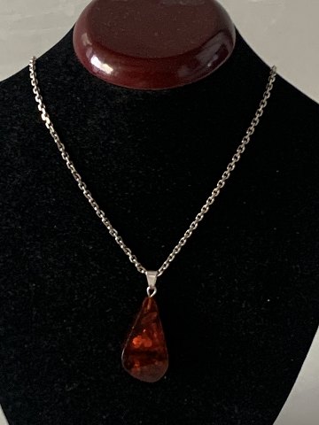 Necklace in Silver with Amber pendant
Length 62 cm