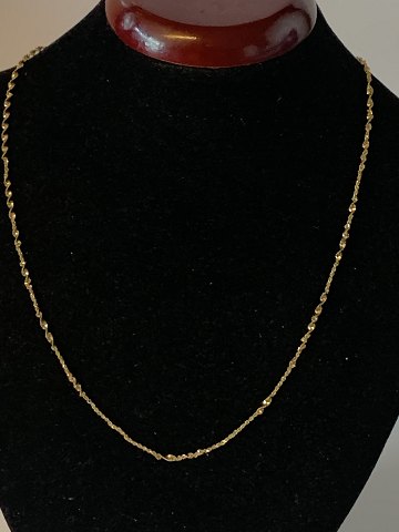 Elegant Halskæde i 14 karat Guld
Stemplet Midas Midas
Længde 49 cm ca