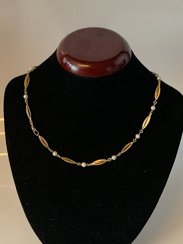 Elegant Halskæde med perler i 14 karat Guld
Stemplet 585
Længde 41 cm ca