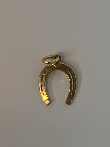 Horse shoe in 14 karat gold
Stamped BH 585
Height 20.98 mm