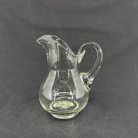 Clear creamer in glass from Holmegaard Glasswork
