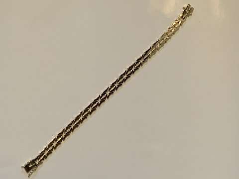 Armbånd i 14 karat guld
Stemplet 585
Længde 19,2 cm ca
Brede 7,05 mm ca