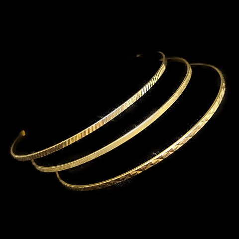 Guldvirke; Three bangles in 14k gold