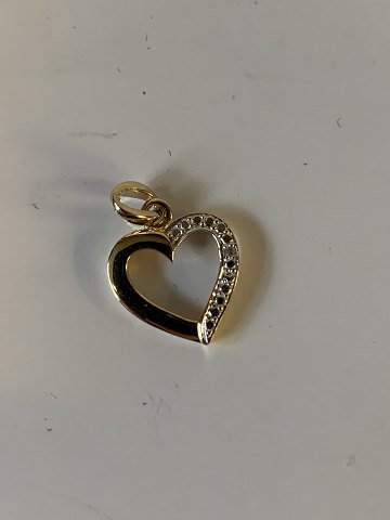Heart Pendant with brilliant in 14K gold
Stamped 585
Height 16.53 cm