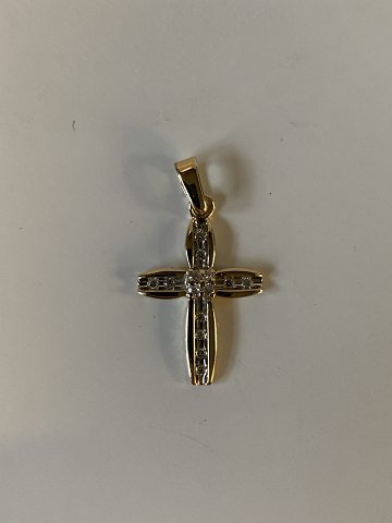 Cross pendant in 14 carat gold
Stamped 585
Height 26.69 mm approx
Width 14.97 mm