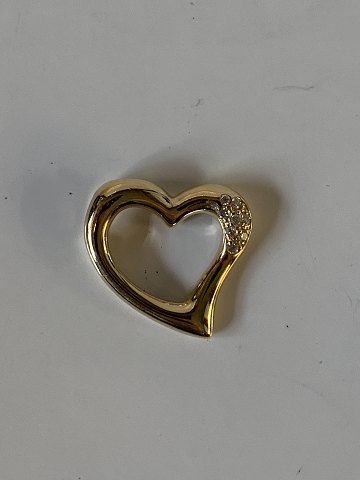 Heart pendant in 14 Karat gold and
Brilliant
Measures
