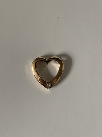 Heart pendant in #"14 carat gold and #brilliant