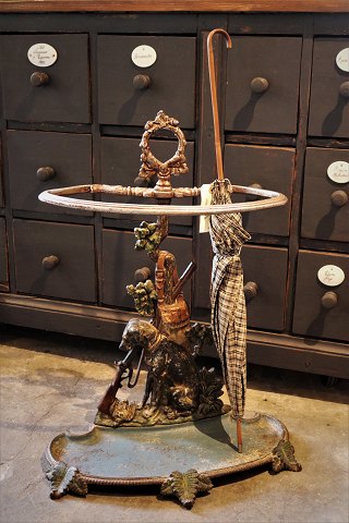 Old 19th century umbrella stand in cast iron with hunting motif 
(Dog and gun)...